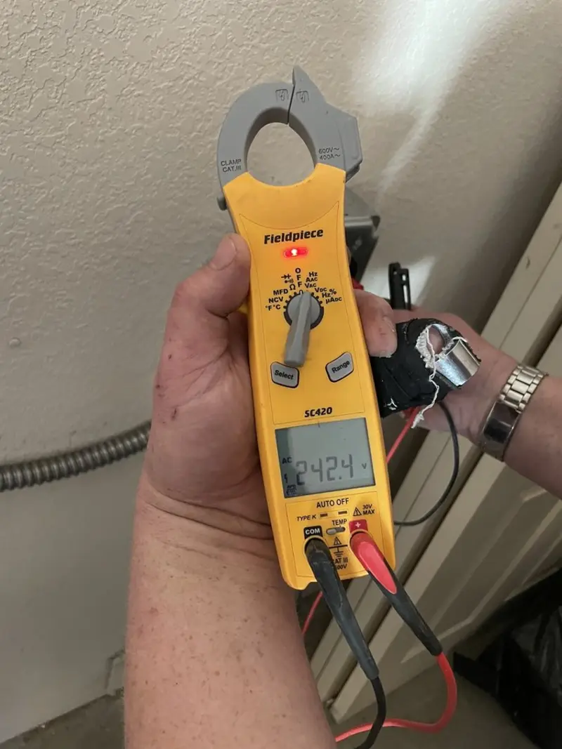 Voltage testing with clamp meter during Hot Tub / Pool Electrical Wiring in Marietta